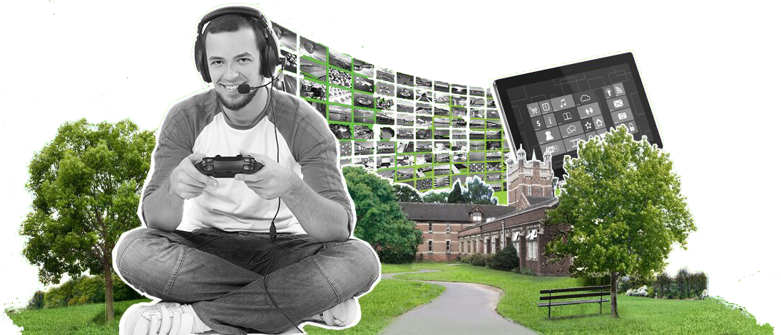 A male sitting cross-legged playing on a games console with Hamstead Campus in the background